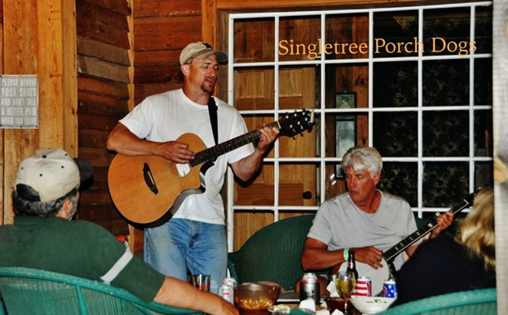 Kirk playing the guitar at Singletree Inn and Cabins - Hanging Rock