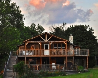 Photo of pink cloud over Singletree Inn and Lodge by Hanging Rock State Park NC